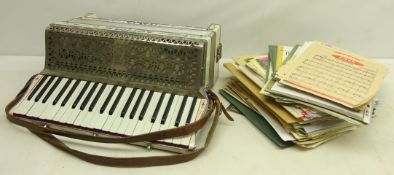 Italian Soprani piano accordion with a selection of vintage sheet music Condition Report