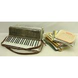 Italian Soprani piano accordion with a selection of vintage sheet music Condition Report