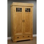 Early 20th century waxed pine double wardrobe with drawer to base, W108cm, H190cm,