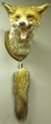 Taxidermy - Fox mask and brush mounted on shield plaque by Simon Wilson, Lakeland Taxidermy, 1999,