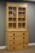 Victorian stripped and waxed pine bookcase on chest,