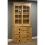 Victorian stripped and waxed pine bookcase on chest,