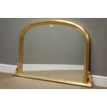 Arched overmantel mirror in moulded gilt frame, W119cm,