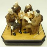 19th century European carved wood and ivory group of four figures around a Tavern table on