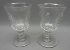 Pair of large Victorian wine glasses, trumpet bowls, baluster stems and circular bases, H17.