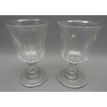 Pair of large Victorian wine glasses, trumpet bowls, baluster stems and circular bases, H17.