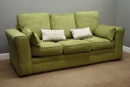 Three seat sofa upholstered in green, W220cm,