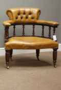 20th Century tub shaped armchair, upholstered in buttoned golden tan leather,