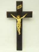 19th century continental carved ivory Corpus Christi, on later ebonised crucifix,