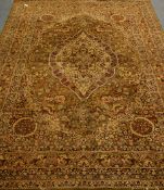 Large Persian style 'Super Kashan' olive ground carpet, large central medallion, floral decoration,
