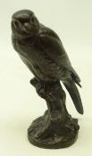 Bronze study of a Kestrel perched on a branch, signed Norl,