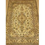 Persian Kashan ivory ground rug, blue interlacing foliage overall design with medallion,