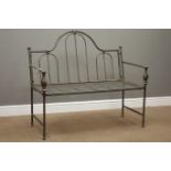 Wrought metal garden bench,