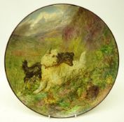 Late 19th century circular charger hand painted moorland scene with two dogs beside a rabbit hole,