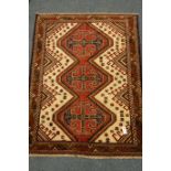 Persian Baluchi rug, triple lozenge medallion, geometric design,