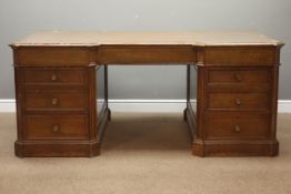 Large 20th century oak partners desk, canted and inverted break top inset with leather,