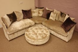 Large corner sofa upholstered in silver velour type fabric with scatter cushions and a deep