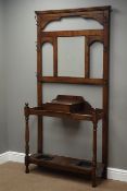 20th century oak hall stand, bevelled mirror back with hinged compartment,