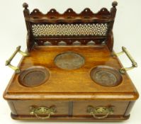 Early 20th century oak smokers stand, with brass fretwork panel,