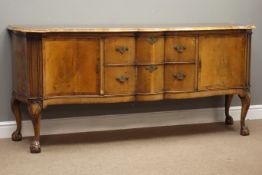 20th century walnut Queen Anne style serpentine sideboard, two cupboards and two drawers,