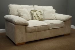 Pair two seat sofas upholstered in cream jumbo cord fabric with scatter cushions, W185cm,