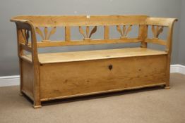 19th century waxed pine bench, scrolled arm supports, hinged seat with storage, W186cm, H88cm,