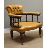 20th Century tub shaped armchair upholstered in buttoned golden tan leather,
