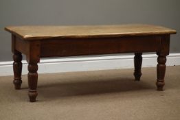 Rectangular oak coffee table on turned supports, 117cm x 49cm,
