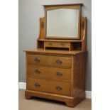 Arts & Crafts oak dressing chest with raised swing mirror, trinket drawer above three long drawers,