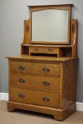 Arts & Crafts oak dressing chest with raised swing mirror, trinket drawer above three long drawers,