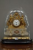 Early 20th century gilt metal and onyx figural mantel clock, circular white enamel Roman dial,