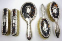 Silver and tortoiseshell five piece dressing table set,