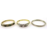 Gold three stone diamond ring stamped 18ct,