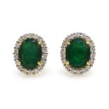 Pair of oval cut emerald and diamond gold cluster stud ear-rings, hallmarked 18ct,