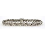 White gold baguette and round brilliant cut diamond bracelet tested 14ct,