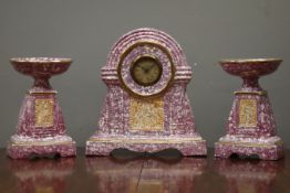 20th century French purple and gold marble effect clock garniture, circular Arabic dial,