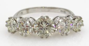 Graduating five stone diamond white gold ring hallmarked 18ct diamonds approx 1.