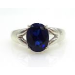 White gold single stone sapphire ring hallmarked 9ct Condition Report Size N,