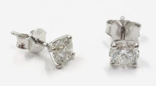 Pair 18ct gold diamond stud ear-rings stamped 750 approx 1 carat Condition Report