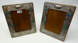 Pair of Art Nouveau silver and enamel on oak freestanding photograph frames by A & J Zimmerman Ltd