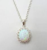 Opal and cubic zirconia pendant necklace stamped 925 Condition Report <a