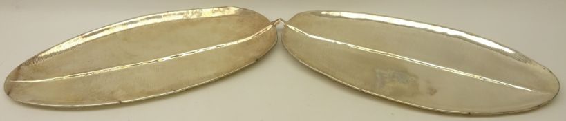 Pair stylized silver-plated banana leaf shaped platters,