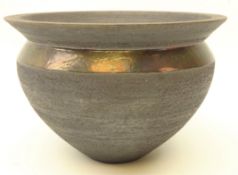 Raku fired jardiniere with flared rim, with metallic band and crackle glaze interior,