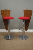 Pair Art Deco style bar stools, walnut finish tapered backs with red upholstered seats,