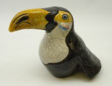 Jennie Hale (British Contemporary) raku fired model of a Toucan, signed to base,