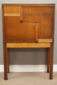 Art Deco oak cabinet, two doors enclosing stepped interior with drawer, W77cm, H115cm,