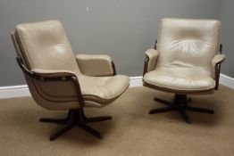 Pair 1970s/80s stained beech framed armchairs upholstered in grey finish leather,