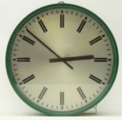 Mid 20th century circular green plastic wall clock with silver dial,