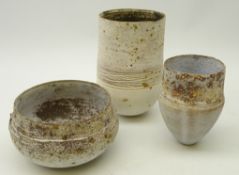 Stephanie Black (British, Contemporary) three hand thrown textured vases, H17.