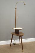 1950s walnut finish and vinyl two tier bedside table with lamp, tapering supports,